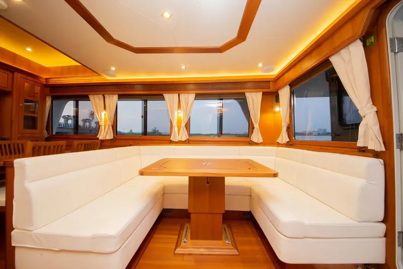 Slide: The Image of Luxurious interior of 2026 Selene 60 Classic Explorer yacht with elegant dining area. - 6
