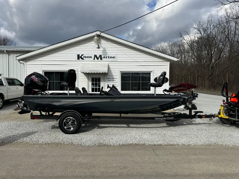 Slide: The Image of 2024 Ranger RT188 boat in front of Knox Marine building. - 0