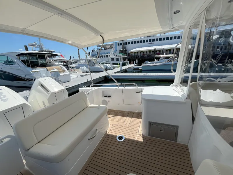 Slide: The Image of 2024 MJM 35 yacht interior with seating area at marina. - 7