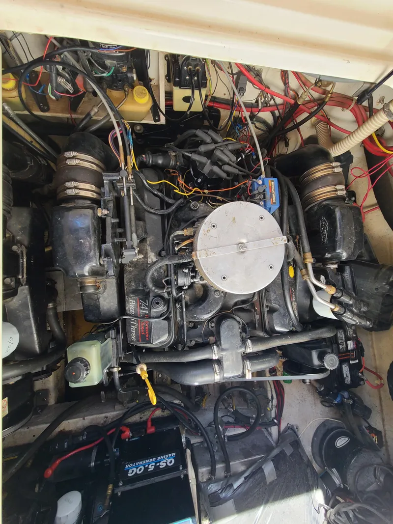 Slide: The Image of 1995 Bayliner Avanti engine compartment with visible wiring and components. - 20