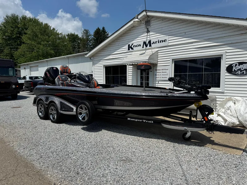 Slide: The Image of 2024 Ranger Z521R CUP boat parked outside Knox Marine dealership. - 2