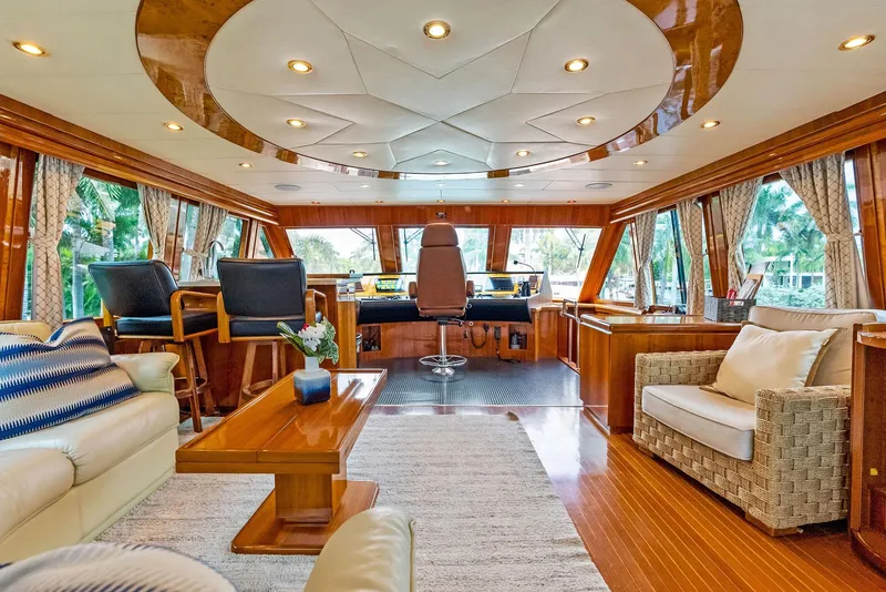 Slide: The Image of Luxurious interior of a 1999 Monte Fino 82 yacht with elegant wood finishes. - 19