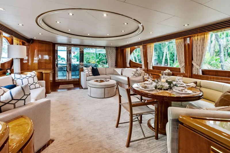Slide: The Image of Luxurious interior of 1999 Monte Fino 82 yacht with elegant seating and dining area. - 20