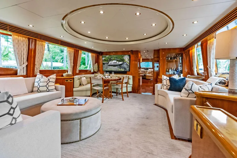 Slide: The Image of Luxurious interior of 1999 Monte Fino 82 yacht with elegant seating and dining area. - 21