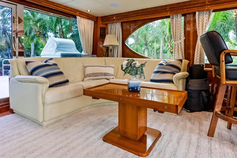 Slide: The Image of Luxurious Monte Fino 82 yacht interior with elegant seating and wooden table, 1999 model. - 27