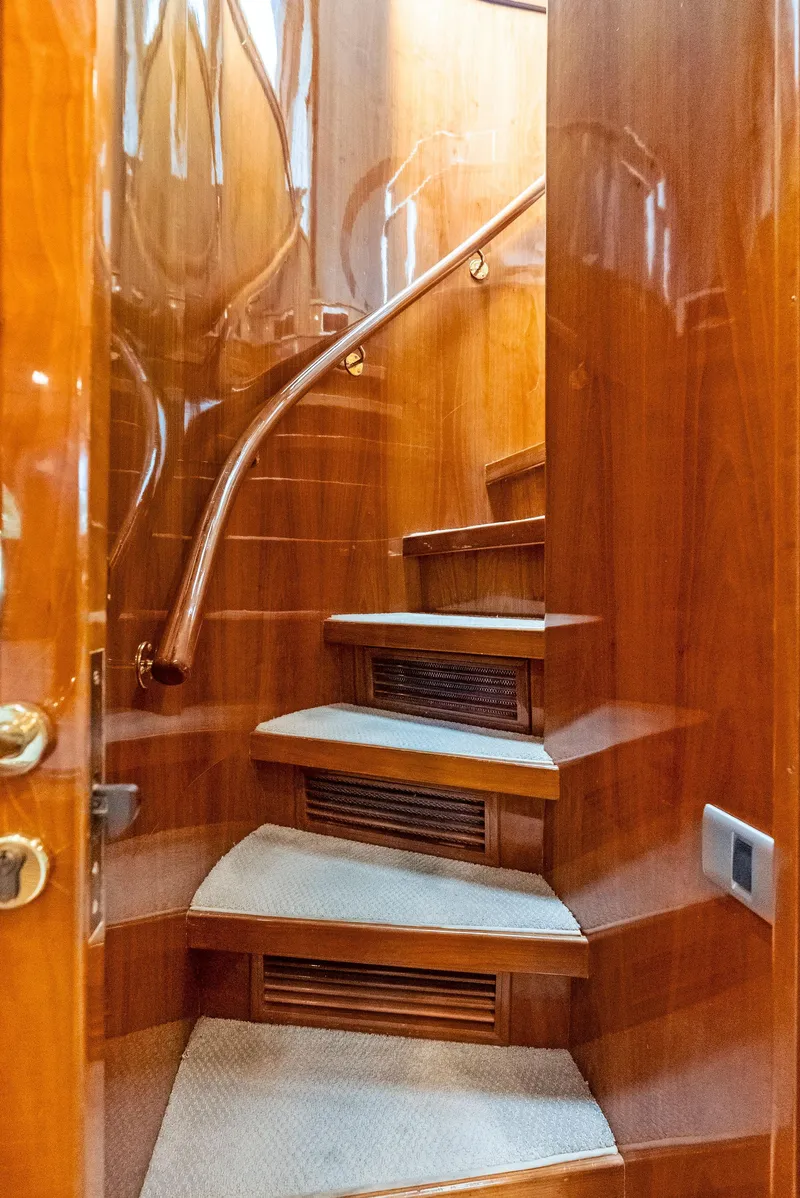 Slide: The Image of Luxurious wooden staircase inside 1999 Monte Fino 82 yacht. - 40