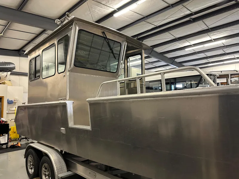 Slide: The Image of 2024 Bayview Boats 26 Landing Craft in a warehouse. - 10