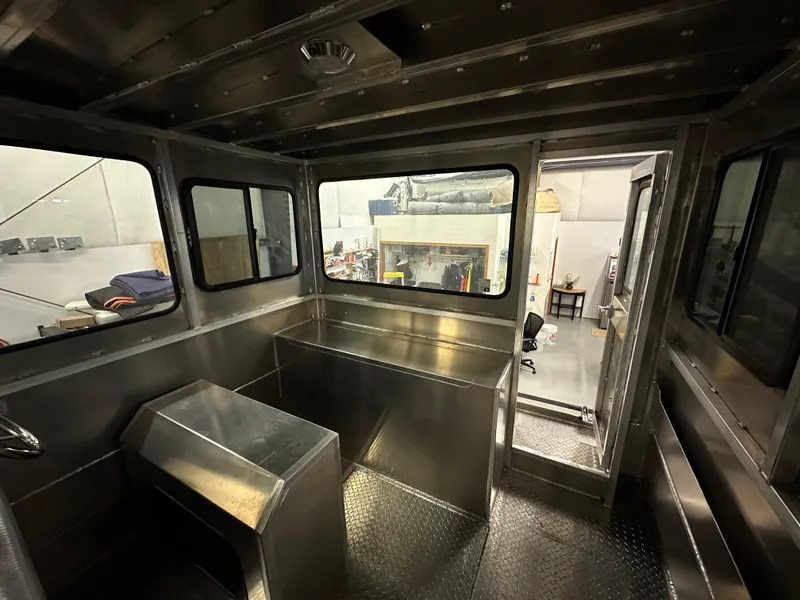 Slide: The Image of Interior of 2024 Bayview Boats 26 Landing Craft, showcasing metal construction and spacious cabin. - 15