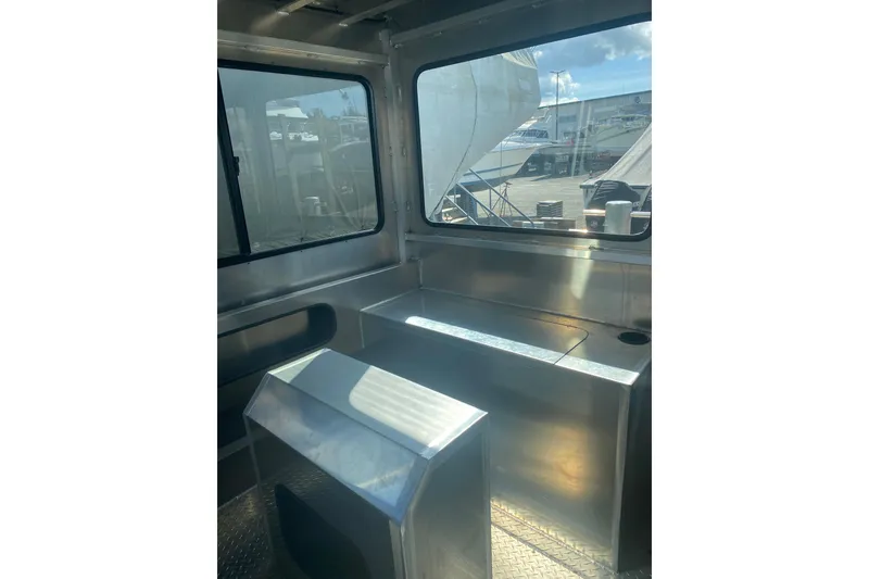 Slide: The Image of Interior view of 2026 Bayview Boats 26 Landing Craft, showcasing sleek metal design. - 30