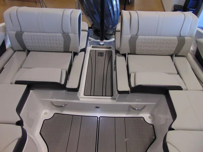 Slide: The Image of 2024 Hurricane SunDeck 2600 OB boat interior with luxurious seating and modern design. - 1