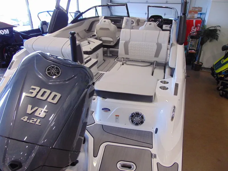 Slide: The Image of 2024 Hurricane SunDeck 2600 OB boat interior with Yamaha 300 V6 4.2L outboard engine. - 2
