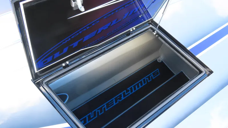 Slide: The Image of Open storage compartment of 2020 Outerlimits 46SC boat. - 12
