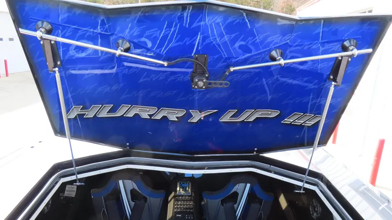 Slide: The Image of 2020 Outerlimits 46SC boat engine compartment with Hurry Up!!! text on the hatch. - 19