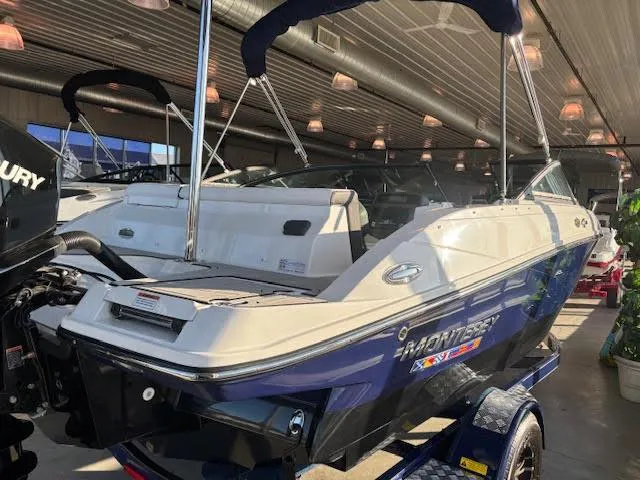 Slide: The Image of 2024 Monterey M205 Family Bowrider interior with sleek seating and modern dashboard design. - 2