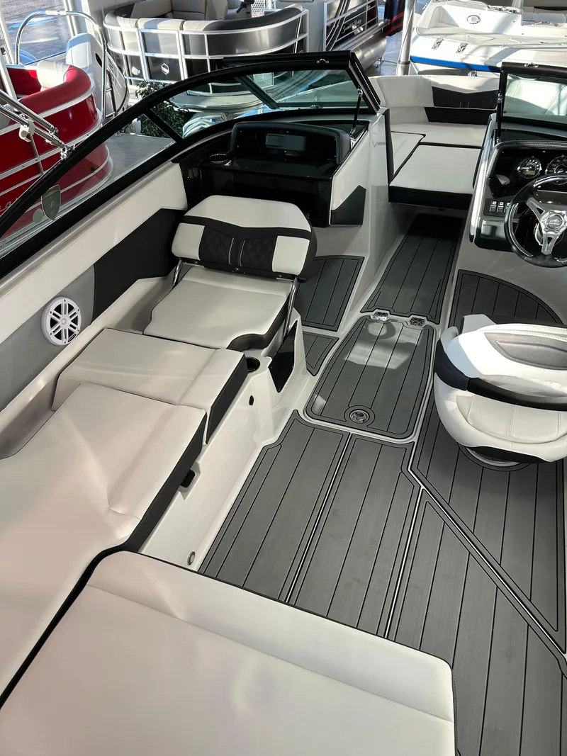 Slide: The Image of 2024 Monterey M205 Family Bowrider interior with spacious seating and modern design. - 3