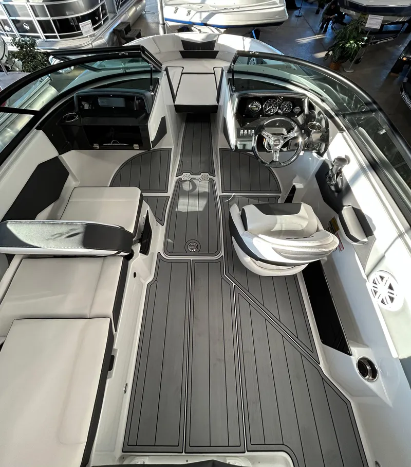 Slide: The Image of 2024 Monterey M205 Family Bowrider interior with sleek seating and modern design. - 5