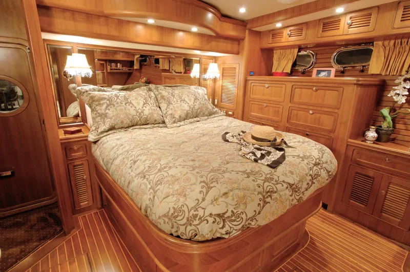Slide: The Image of Luxurious bedroom interior of 2026 Selene 54 Classic Explorer yacht with elegant wood finish. - 12