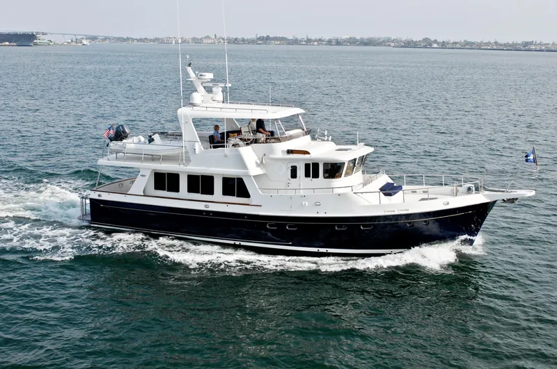 Slide: The Image of 2026 Selene 54 Classic Explorer yacht cruising on open water. - 2