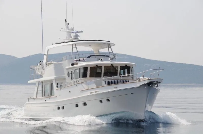 Slide: The Image of 2026 Selene 54 Classic Explorer yacht cruising on calm waters. - 3