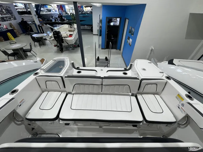 Slide: The Image of 2024 Yamaha Boats 255 FSH Sport H interior view in showroom. - 13