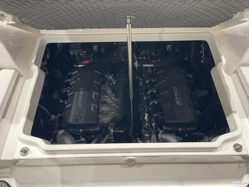 Slide: The Image of 2024 Yamaha Boats 255 FSH Sport H engine compartment with twin SVHO engines. - 19
