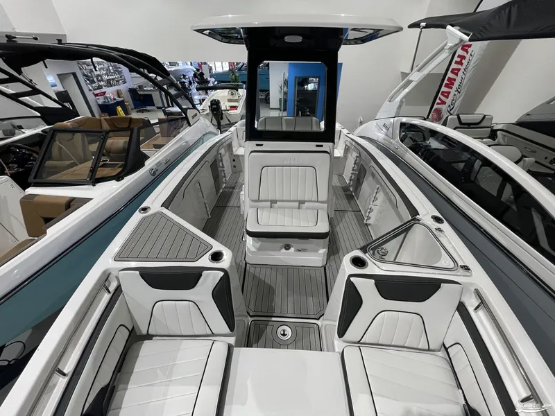 Slide: The Image of 2024 Yamaha Boats 255 FSH Sport H interior with sleek seating and modern design. - 6