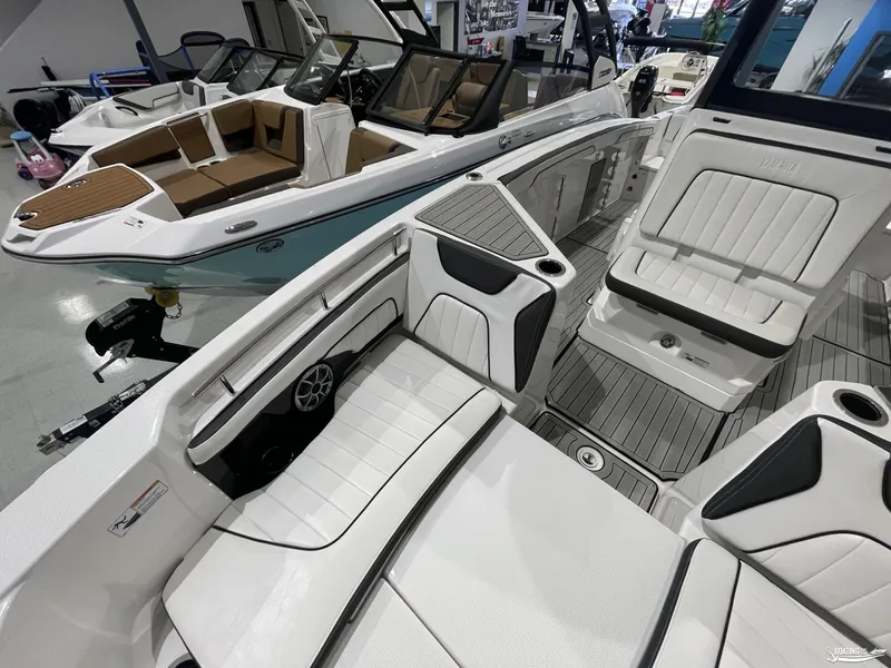 Slide: The Image of 2024 Yamaha Boats 255 FSH Sport H interior with sleek seating and modern design. - 8