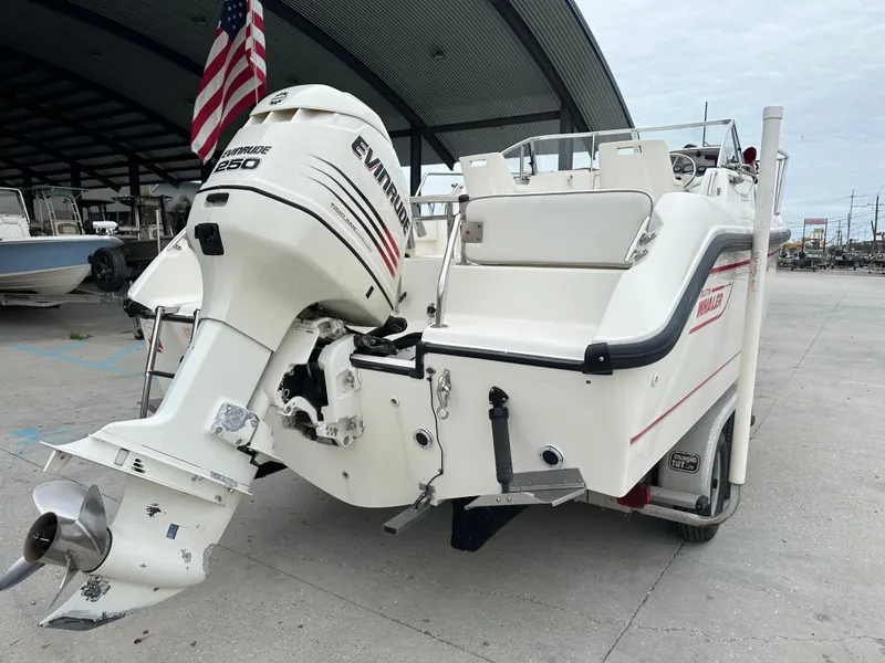 Slide: The Image of 1998 Boston Whaler 23 Conquest with Evinrude 250 outboard motor. - 2