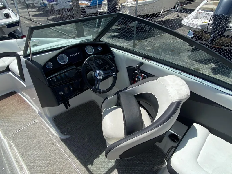 Slide: The Image of 2019 Bryant Speranza boat interior with steering wheel and seating. - 11