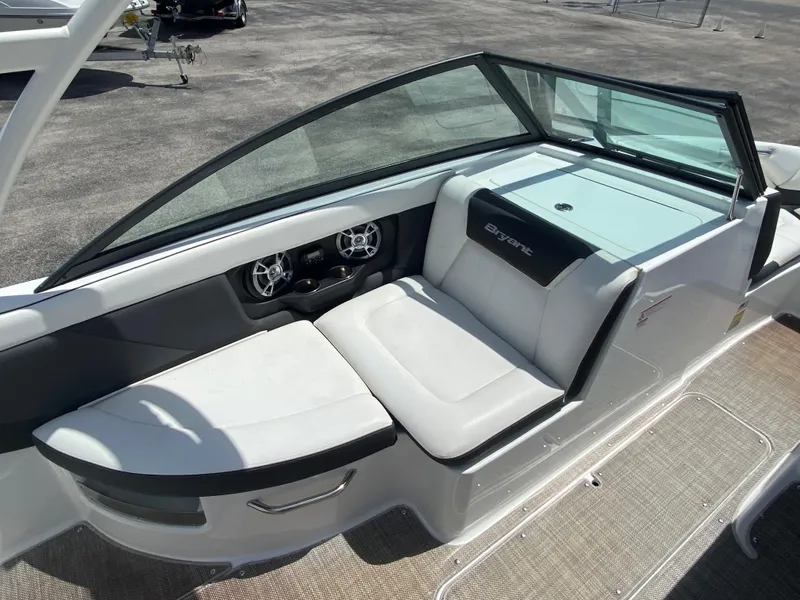 Slide: The Image of 2019 Bryant Speranza boat interior with white seating and modern dashboard. - 12