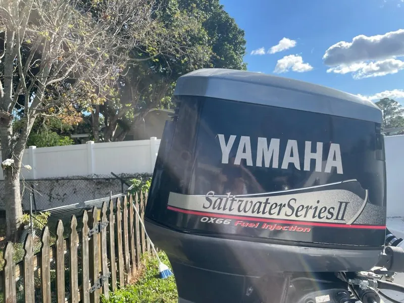 Slide: The Image of Yamaha Saltwater Series II outboard motor on a 2002 Edgewater 260 Center Console boat. - 25