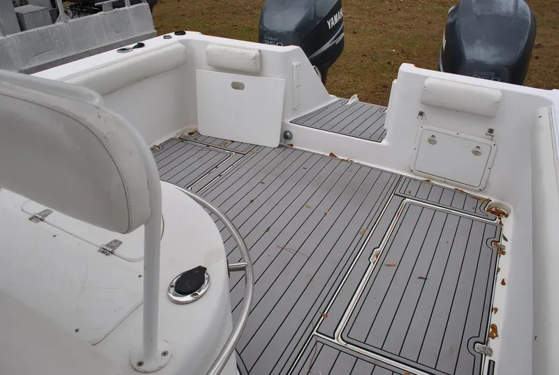Slide: The Image of 2001 ProKat 2800KAT boat interior with Yamaha engines, featuring spacious deck and seating. - 17