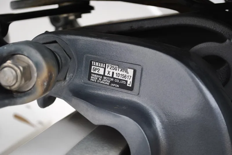 Slide: The Image of Close-up of Yamaha F250 motor part on 2001 ProKat 2800KAT boat. - 20