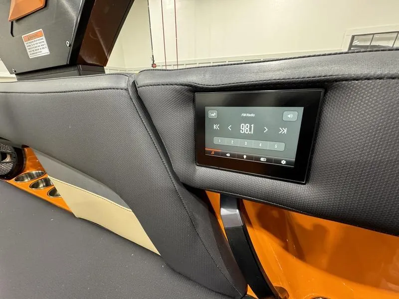 Slide: The Image of 2024 MasterCraft XStar S interior with touchscreen control panel. - 13