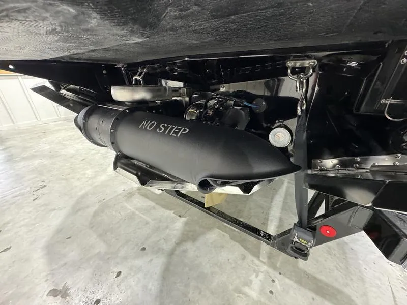 Slide: The Image of 2024 MasterCraft XStar S boat underside with No Step warning. - 3