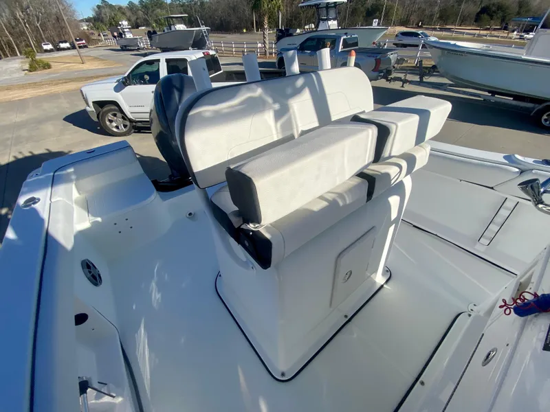 Slide: The Image of 2016 Clearwater 2200CC boat with white seating and console. - 10