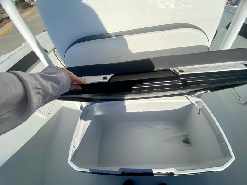 Slide: The Image of 2016 Clearwater 2200CC boat storage compartment being opened. - 24