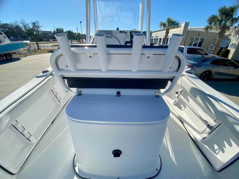Slide: The Image of 2016 Clearwater 2200CC boat with rod holders and storage compartments. - 8