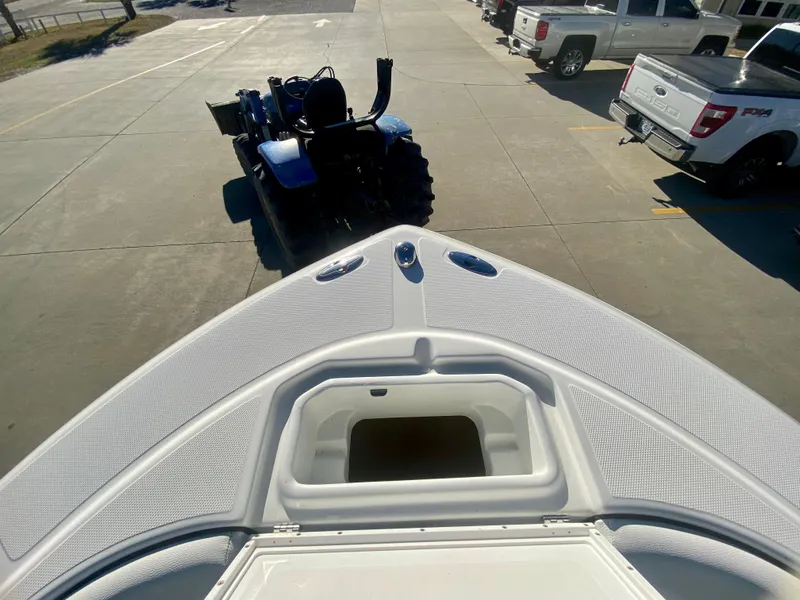 Slide: The Image of 2016 Clearwater 2200CC boat bow view with storage compartment. - 27