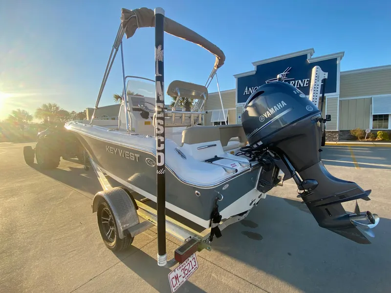 Slide: The Image of 2020 Key West 189 FS boat with Yamaha outboard motor on trailer. - 4