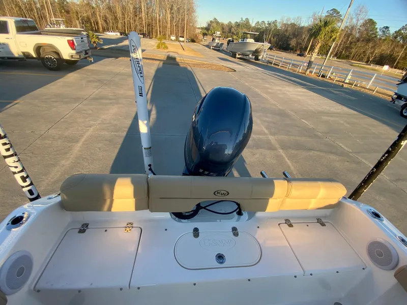 Slide: The Image of 2020 Key West 189 FS boat with outboard motor in parking lot. - 6