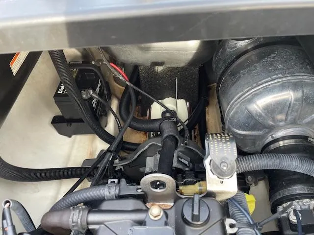 Slide: The Image of 2020 Yamaha WaveRunner VX Deluxe engine compartment with visible components and wiring. - 7