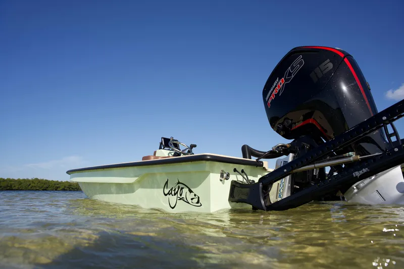 Slide: The Image of 2023 Cayo Boatworks 180 in shallow water with outboard motor. - 29