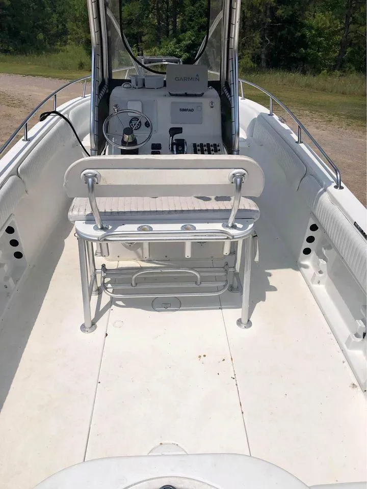 Slide: The Image of 2006 Sea Chaser 245 LX Bay Runner boat interior with seating and control console. - 10