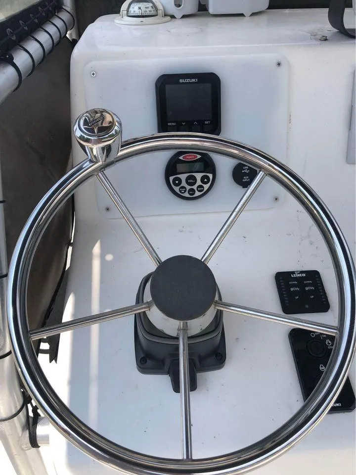 Slide: The Image of Steering console of a 2006 Sea Chaser 245 LX Bay Runner boat. - 4