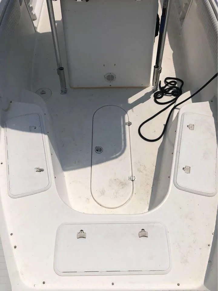 Slide: The Image of 2006 Sea Chaser 245 LX Bay Runner boat deck with storage compartments. - 6