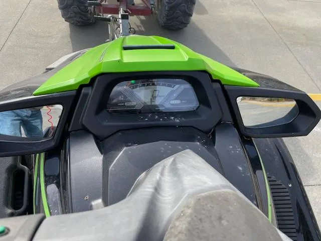 Slide: The Image of 2020 Yamaha WaveRunner VX Deluxe dashboard with digital display and green accents. - 9