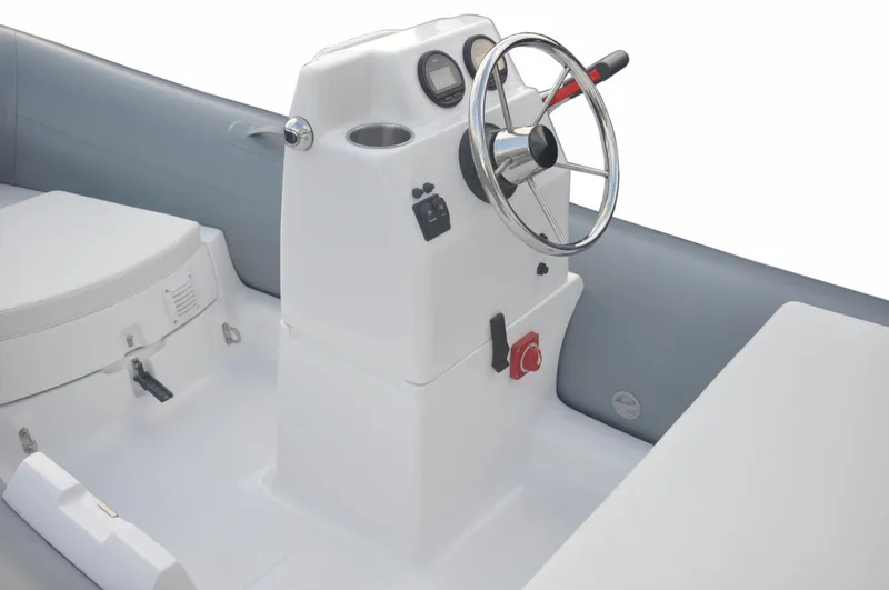 Slide: The Image of 2024 AB 11 VSX boat console with steering wheel and controls. - 5
