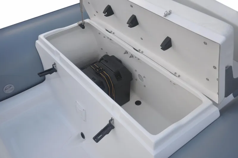 Slide: The Image of 2024 AB 11 VSX boat storage compartment with open lid and battery inside. - 8