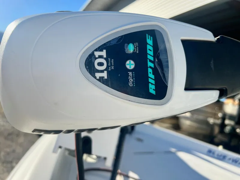 Slide: The Image of Close-up of Riptide 101 trolling motor on 2011 Blue Wave Pure Bay 2400 boat. - 11